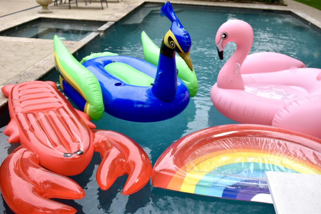 4 pool floats in pool