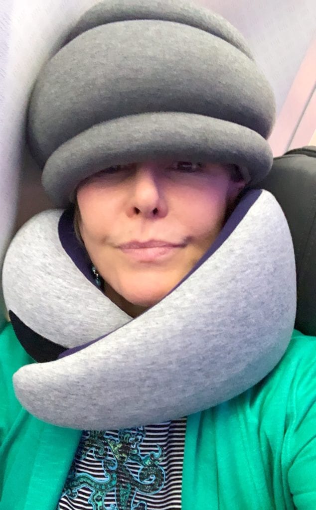 SheShe Show wearing travel pillows