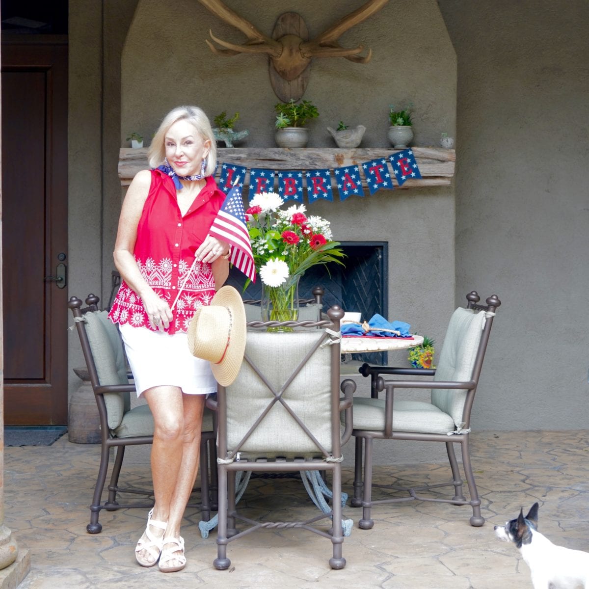 Sheree Frede of the SheShe Show wearing red top and white skort entertaining on the 4th of July