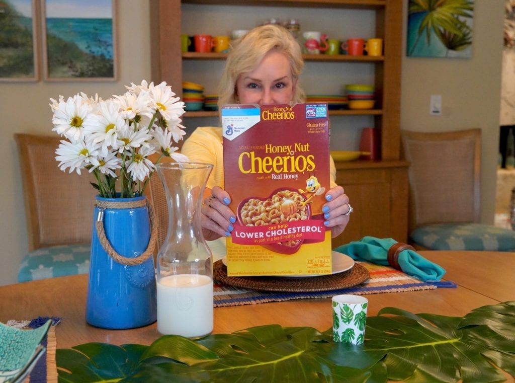 Sheree Frede at breakfast table eating Cheerios