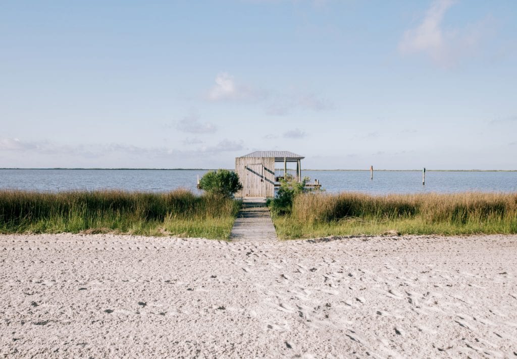 Sand beach old shack Mississippi Sound