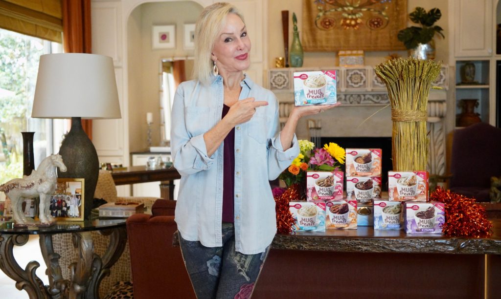 Sheree of the SheShe Show holding Betty Crocker Mug Treat box