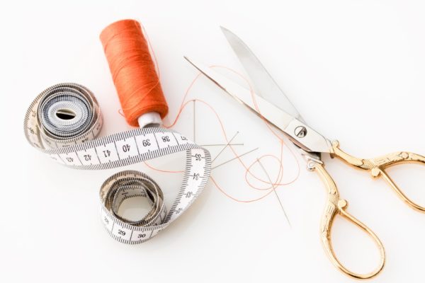 scissors, measuring tape, thread