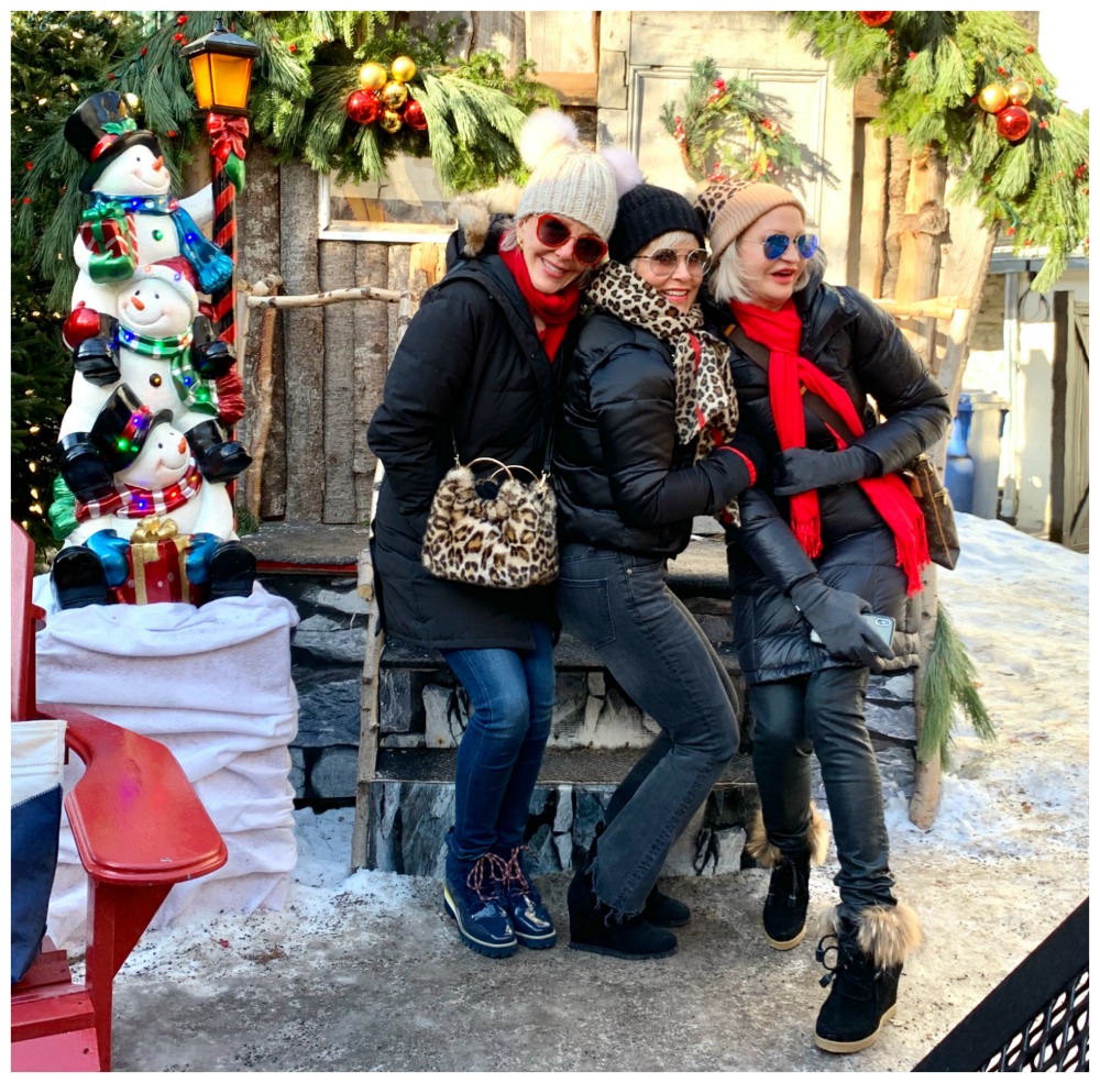 Sheree of SheSheShow, Shauna, Jamie huddled up in the cold at German Christmas Market Quebec City