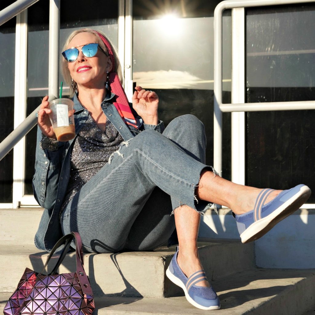 Sheree Frede wearing sequin top and blue jean top and bottoms