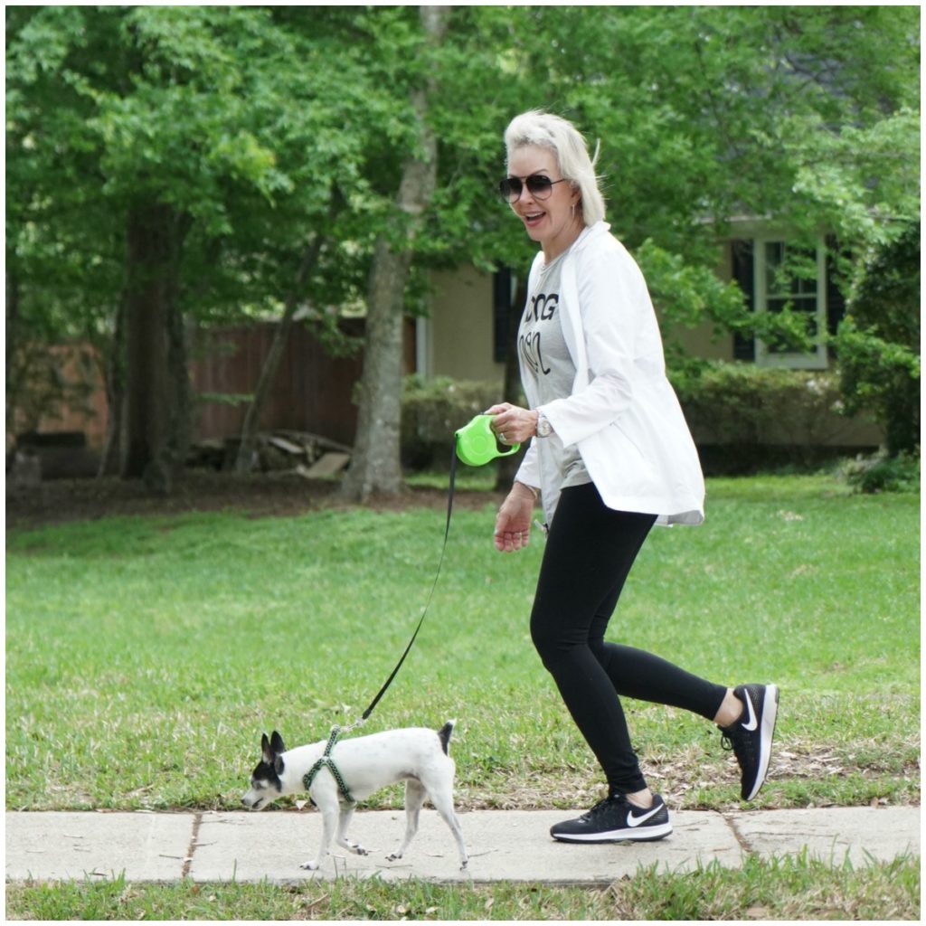 Sheree Frede of the SheShe Show running outside with her dog 