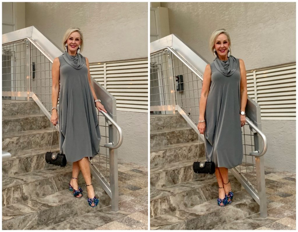 Sheree Frede going up stairs wearing a grey bubble dress