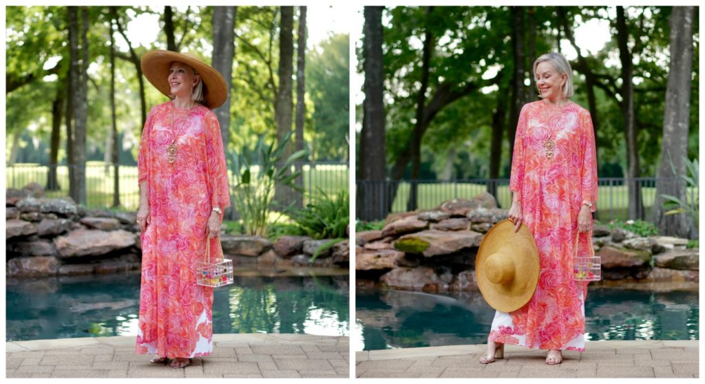 Sheree Frede of the SheShe Show by swimming pool wearing a coral floral kaftan