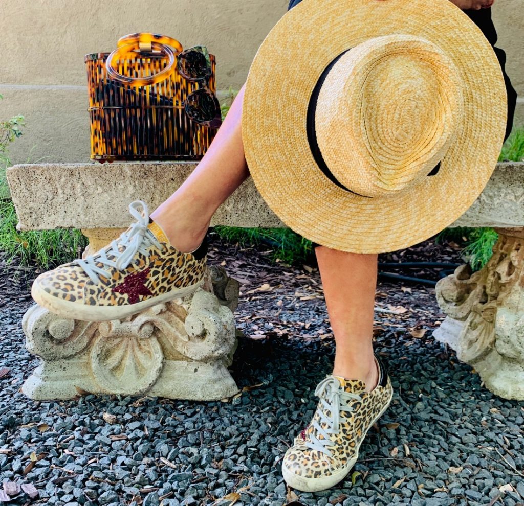 Golden Goose Sneakers, Sun hat and Cult Gaia handbag