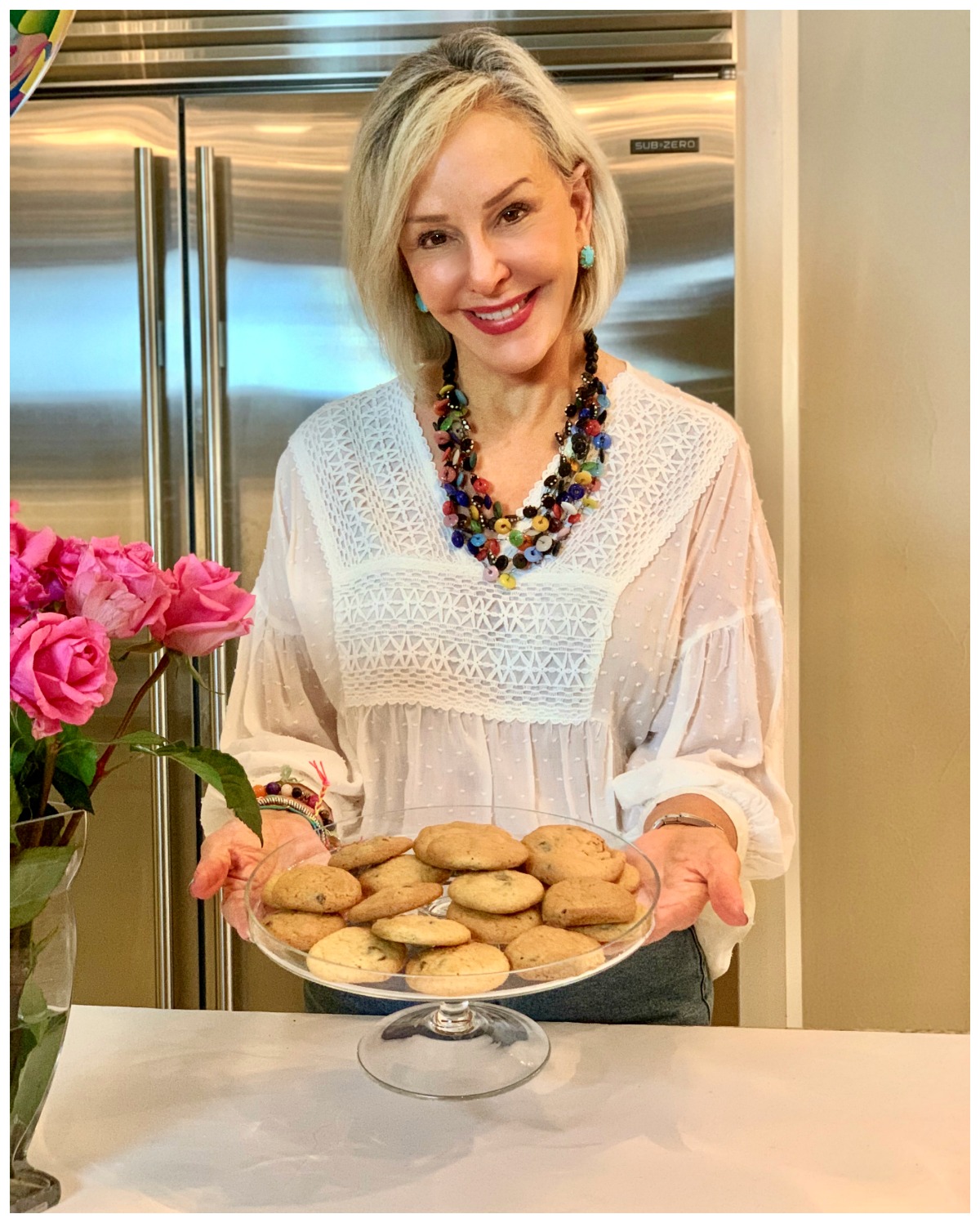 Sheree Frede of the SheSheShow holding a patter of chocolate chip cookies by Betty Crocker