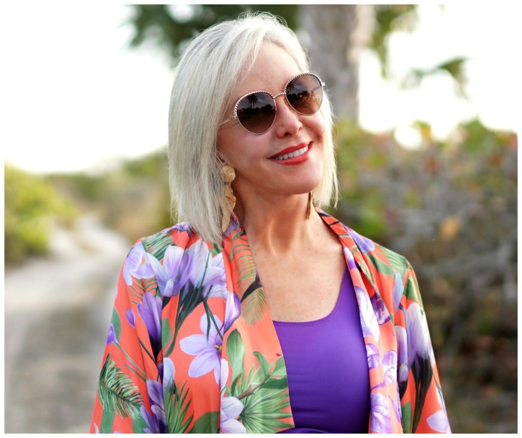 Sheree Frede of the SheShe Show wearing sunglasses and floral top