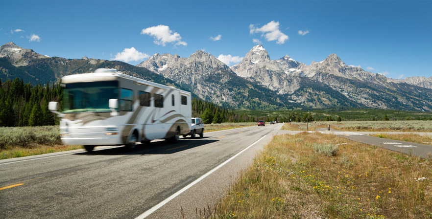 Travel RV driving down the highway