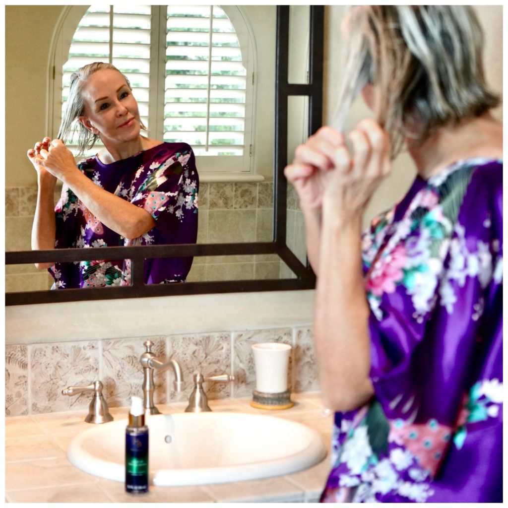 Sheree Frede with the SheShe SHow showing Hair Biology products wearing a purple kimono