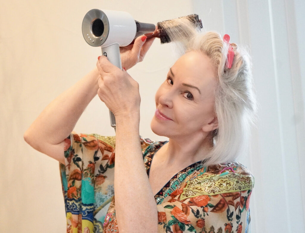 Sheree Frede of the SheShe Show blowdrying her hair bob hairstyle