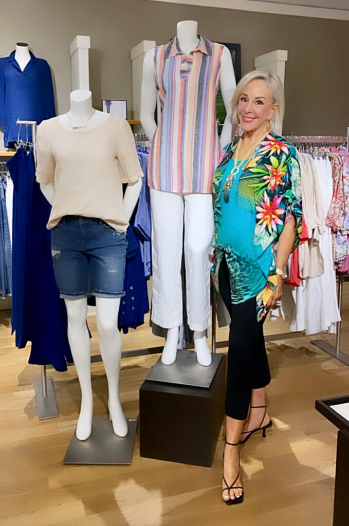 Sheree Frede of the SheShe Show standing by a mannequin