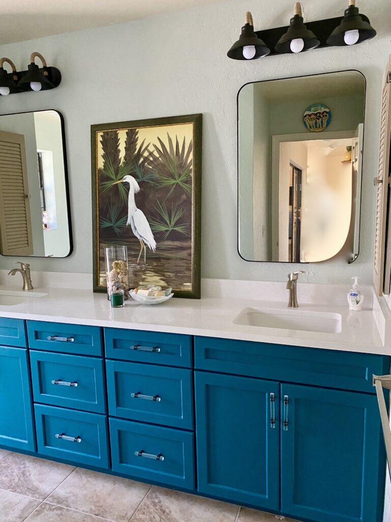 Bathroom update, teal cabinets, white quartz, mirrors