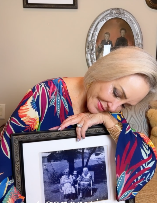 Sheree frede's Mother's Day Message holding picture of women in the family