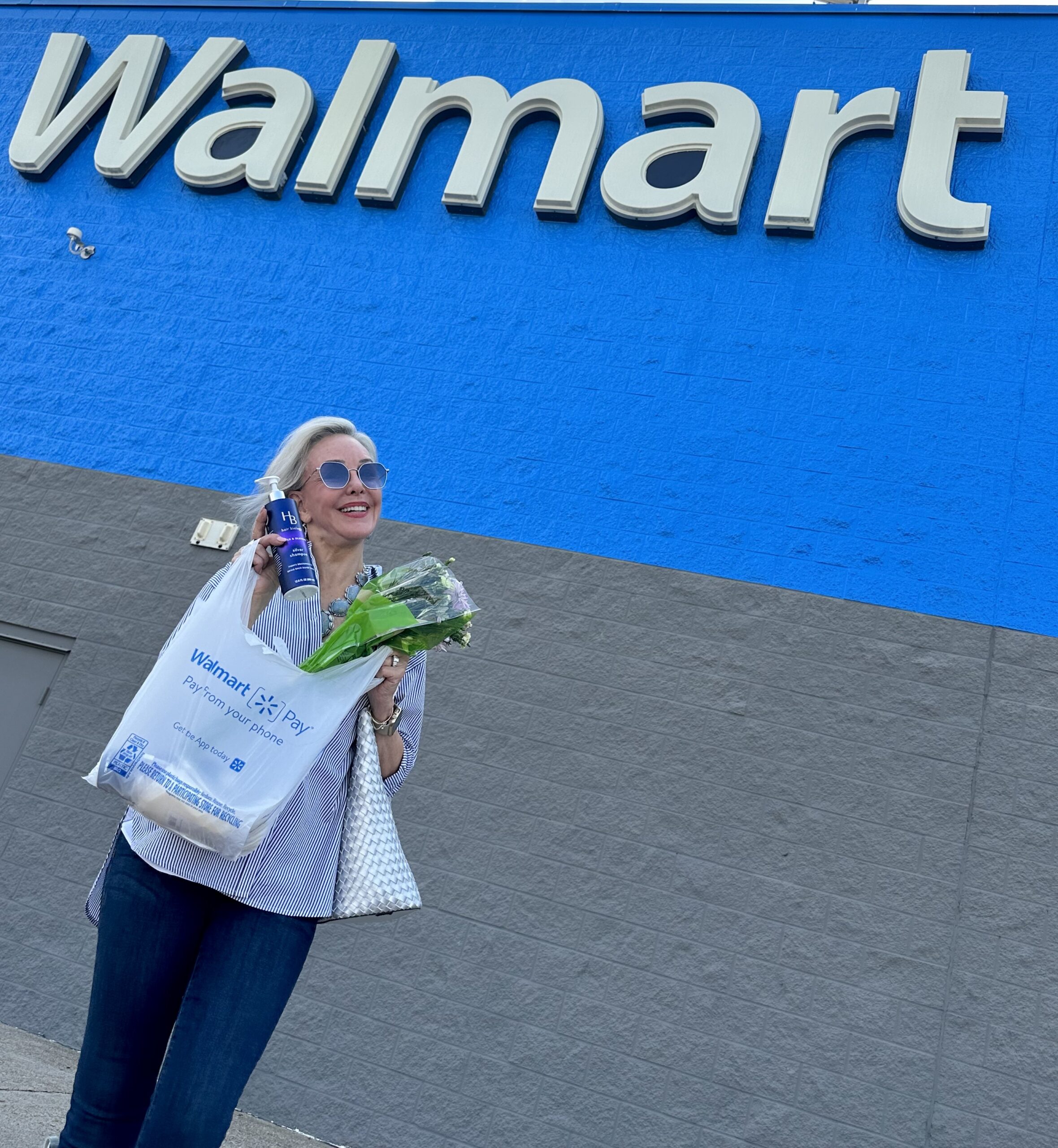 Sheree Frede of the SheShe Show standing in front of Walmart with her shopping bag