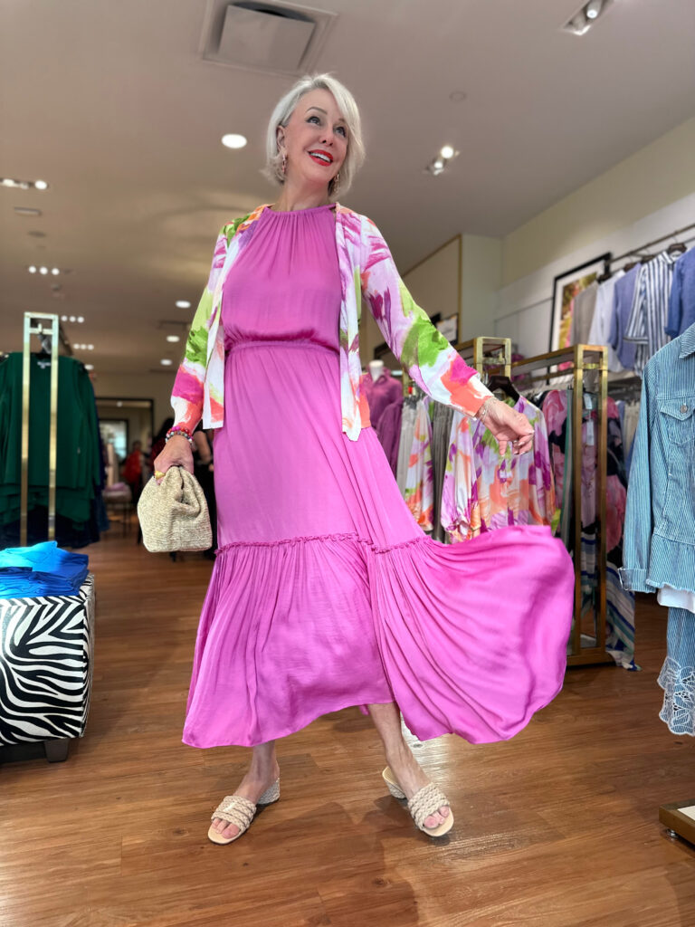 Sheree Frede of the SheShe SHow wearing a hot pink maxi dress