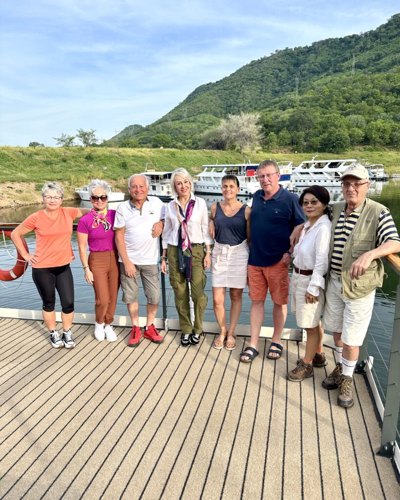 8 people ion bow of boat that we traveled with