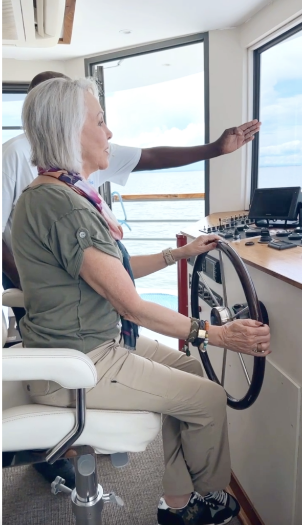 Sheree Frede at the wheel of the African Dream ship