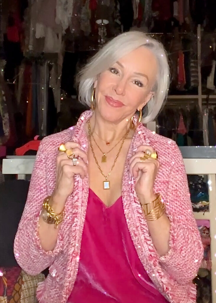 Sheree Frede wearing pink outfit with Dean Davidson jewelry