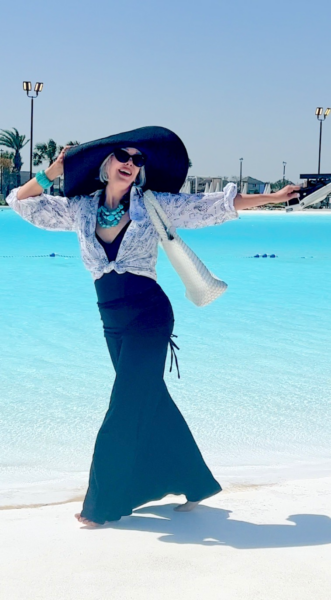 Sheree Frede wearing wide leg pants over a swimsuit