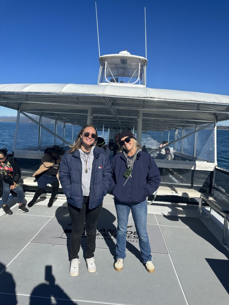 Our crew on a boat enjoying a whale watching tour