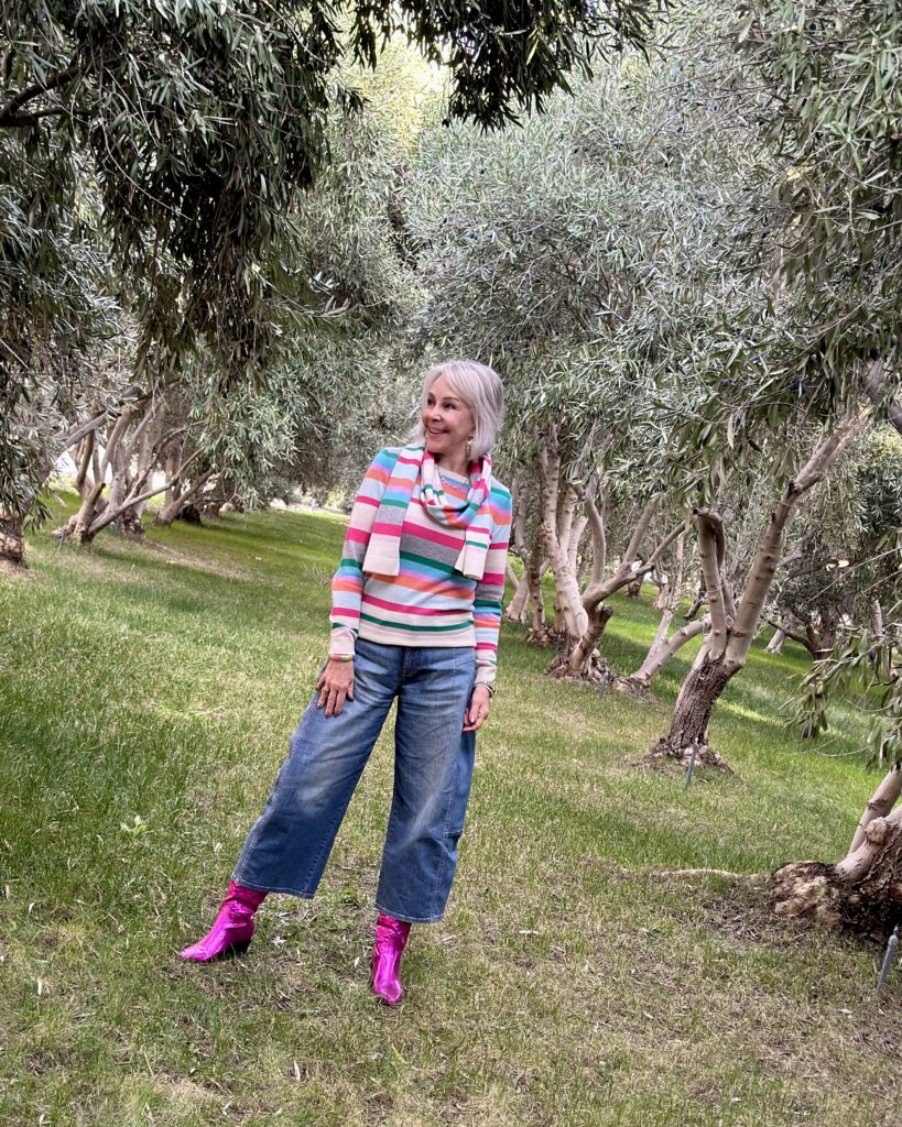 Sheree standing in an olive orchard