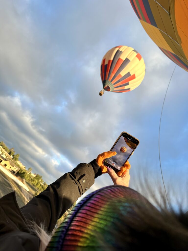 Sheree taking a phot of another balloon. Great Escape Hot Air Balloo ride
