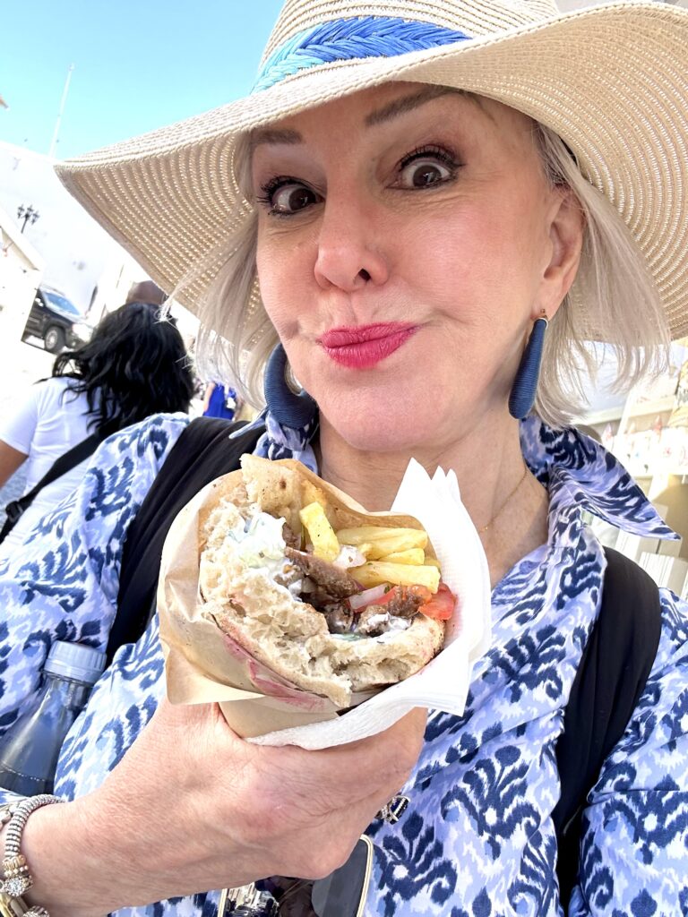 Sheree Frede eating a Gyros sandwich in Fira