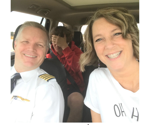 Laurie and her piot husband sitting in the cockpit. Travel tips