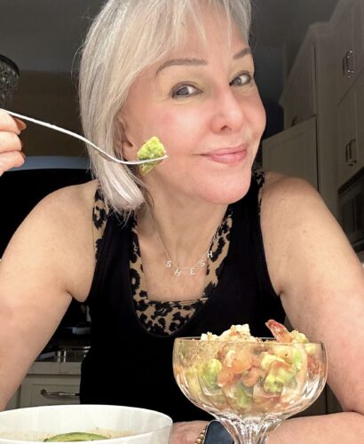 Sheree eating a healty dinner of ceviche for a healthy lifestyle