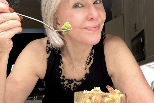 Sheree eating a healty dinner of ceviche for a healthy lifestyle