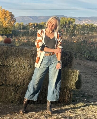 Checkered chic and on trend orange and white sweater and wide leg jeans