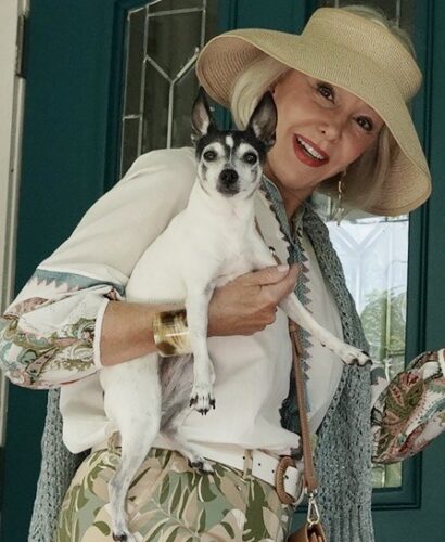 Sheree wearing a hat and holding Pippa Mother's Day